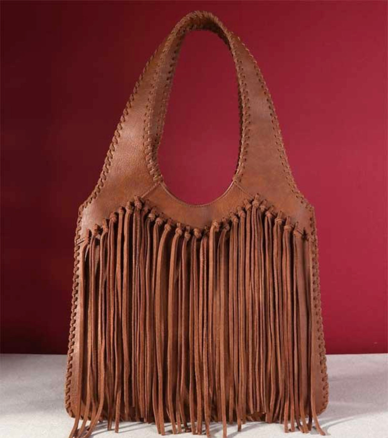 Fringe natural leather purse ￼